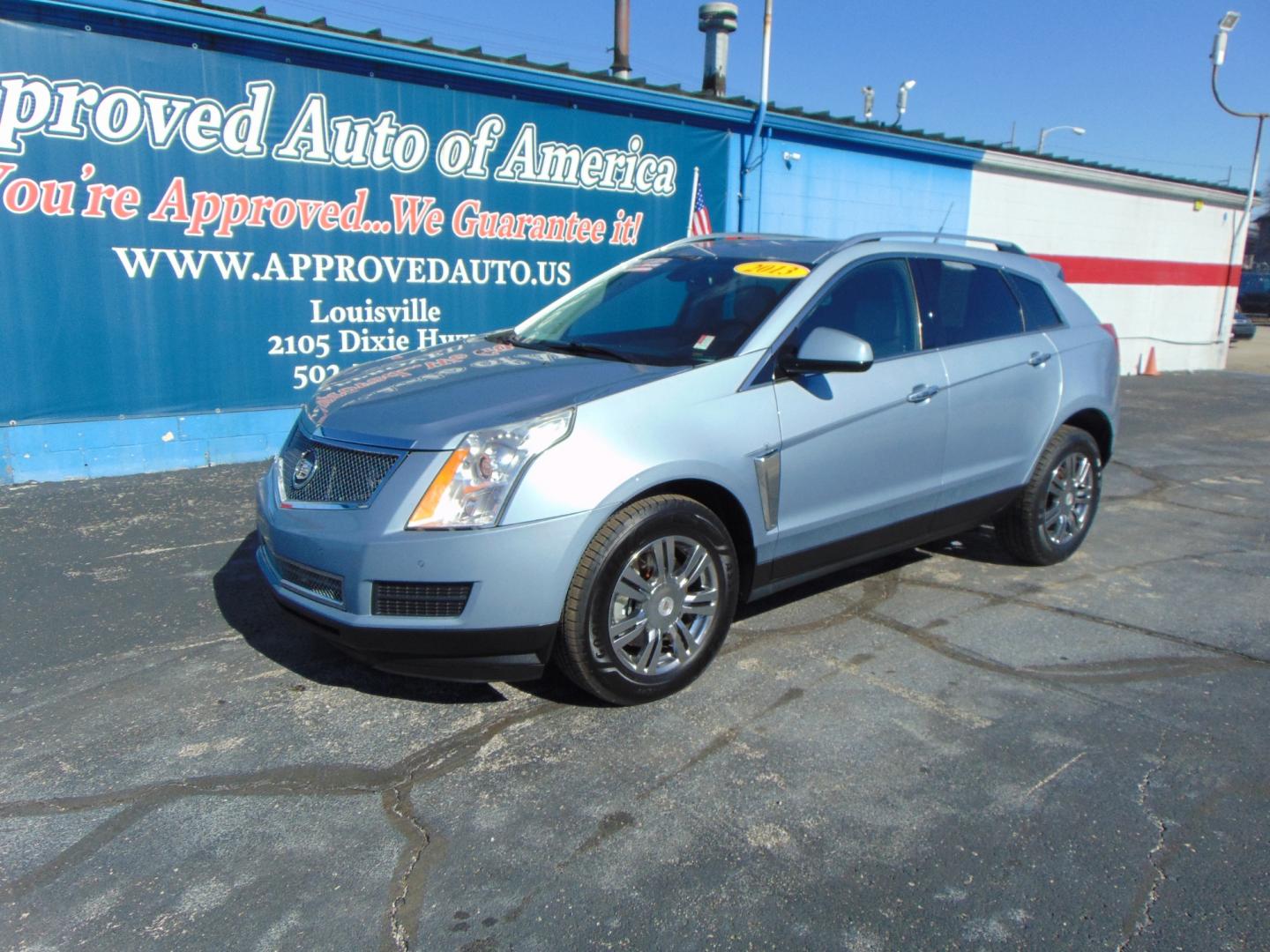 2013 Blue Cadillac SRX (3GYFNCE3XDS) with an V6 Flex Fuel 3.6 Liter engine, Auto, 6-Spd w/TAPshift transmission, located at 2105 Dixie Hwy, Louisville, KY, 40210, (502) 772-3333, 38.220932, -85.795441 - Photo#2